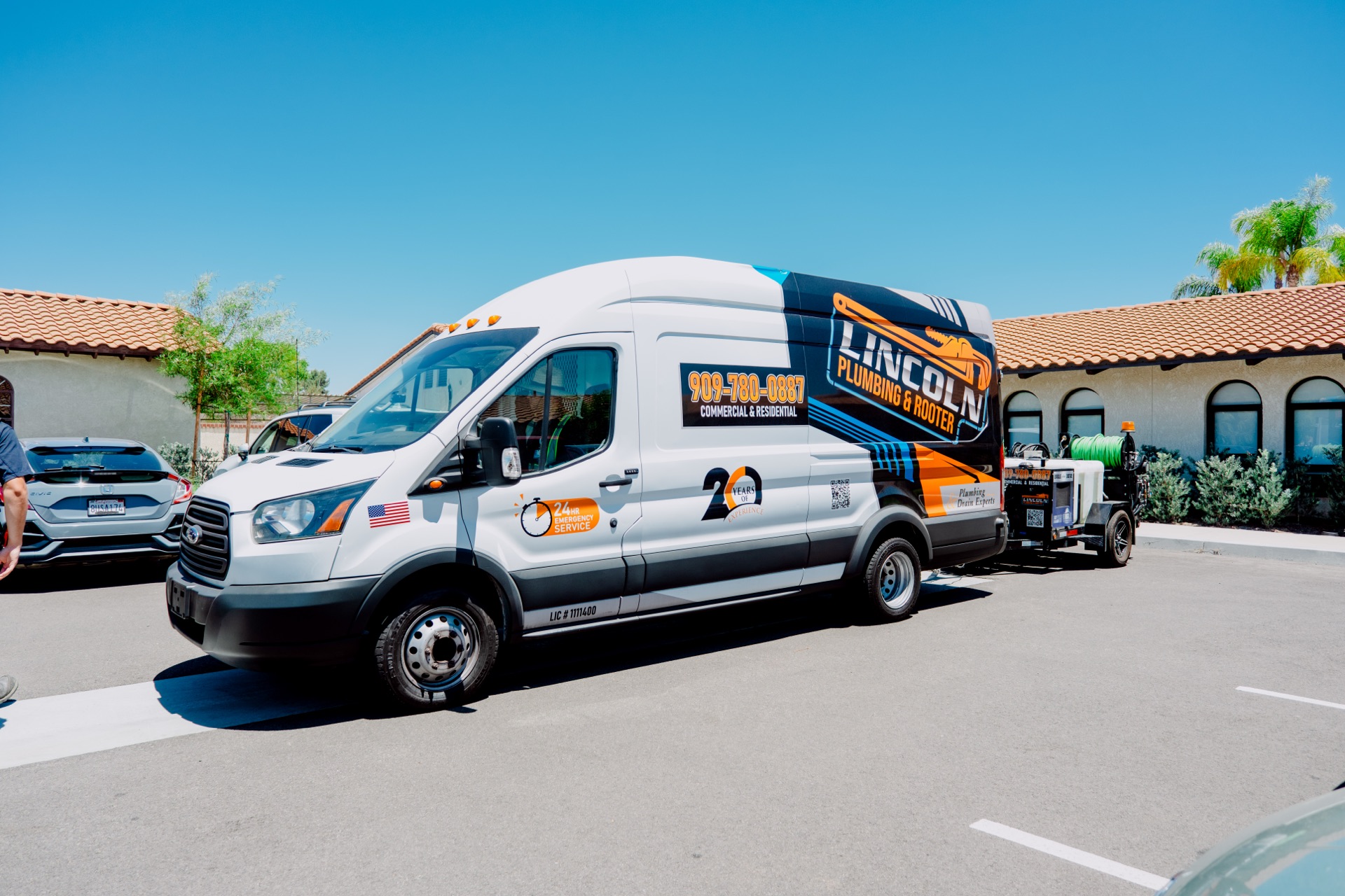 Lincoln Plumbing & Rooter service van with hydrojetting trailer