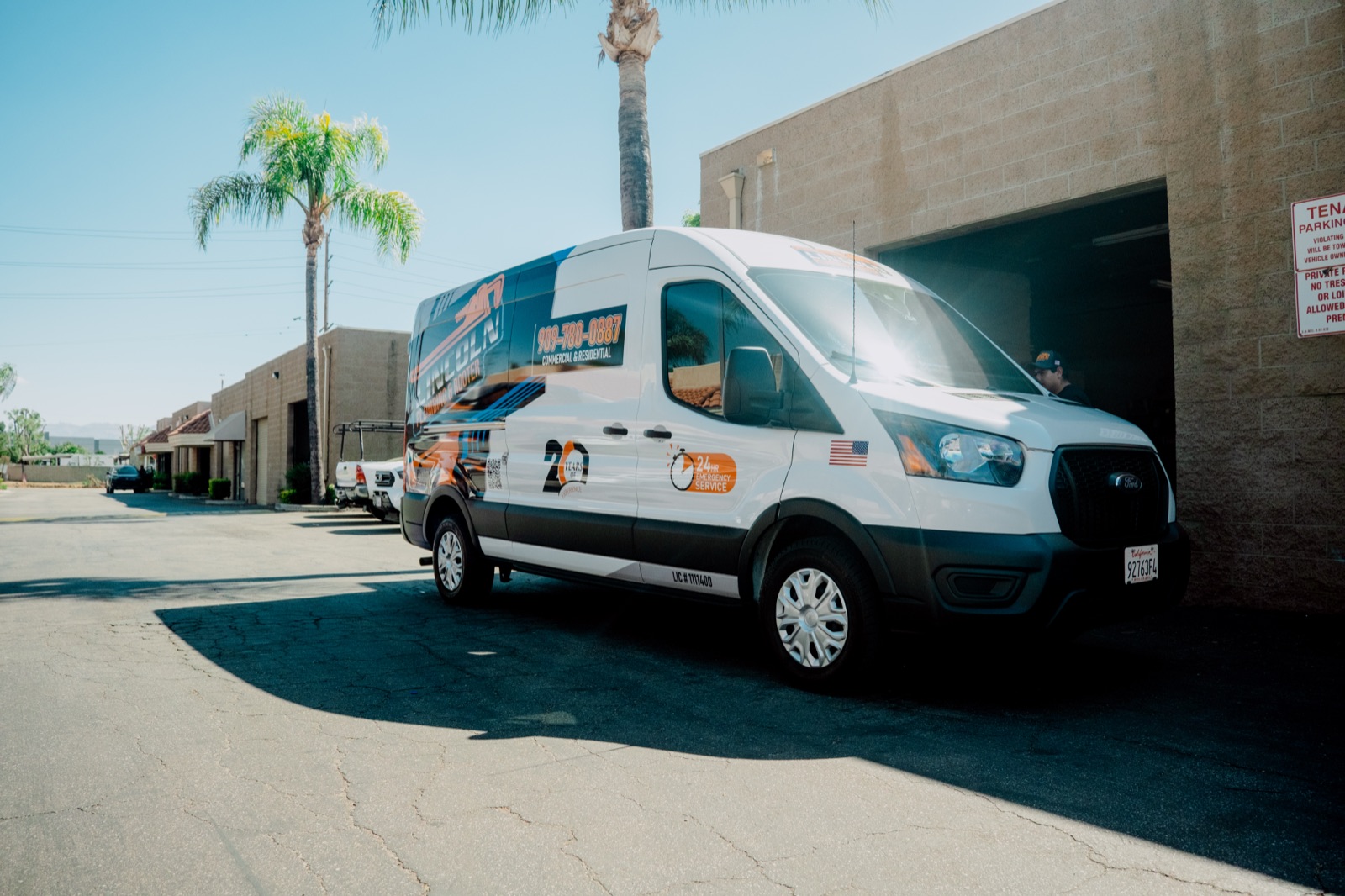Lincoln Plumbing & Rooter van outside the shop
